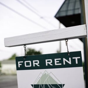 for rent sign in front of rental property